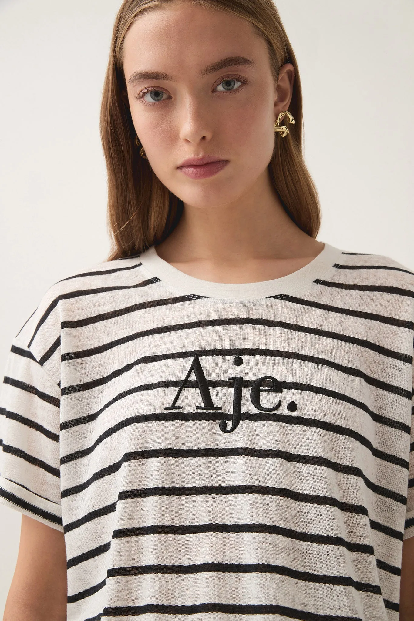 Perela Stripe Logo Tee